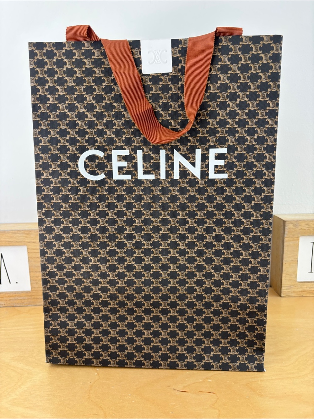 Celine Brown Monogram paper bag with Rust Ribbon Handles